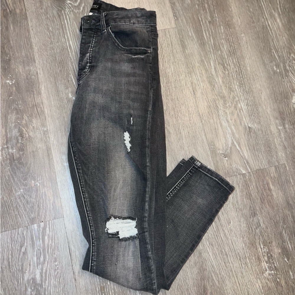 Women’s Distressed Black Jeans
